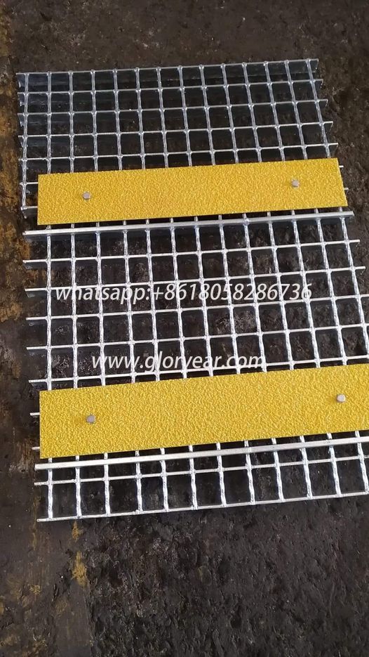 steel grating with yellow strip nosing
